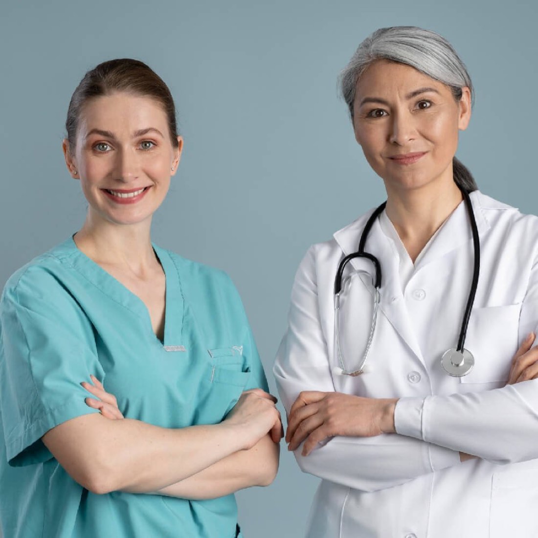 Two Clarity Healthcare nurses standing together